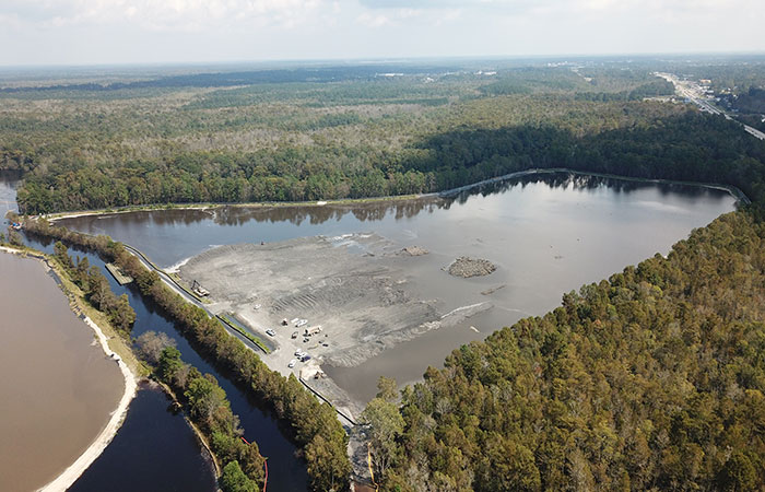 Aerial view of Grainger’s Ash Pond 2, which being pumped with water to equalize pressure on the dikes from the rising waters of the Waccamaw River.