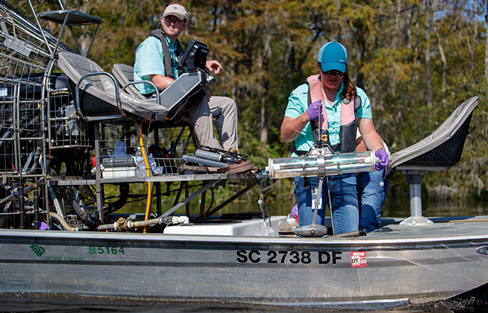 Crews with Biological Services check the water quality of the Waccamaw River for any signs of ash contamination Friday, Sept. 21, 2018 in Conway.