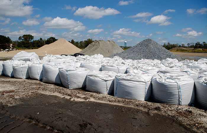 Sand bags sit ready to deploy in the event of a river breach of the dikes surrounding the Grainger ash ponds before river levels rise as a result of flooding caused by Hurricane Florence.