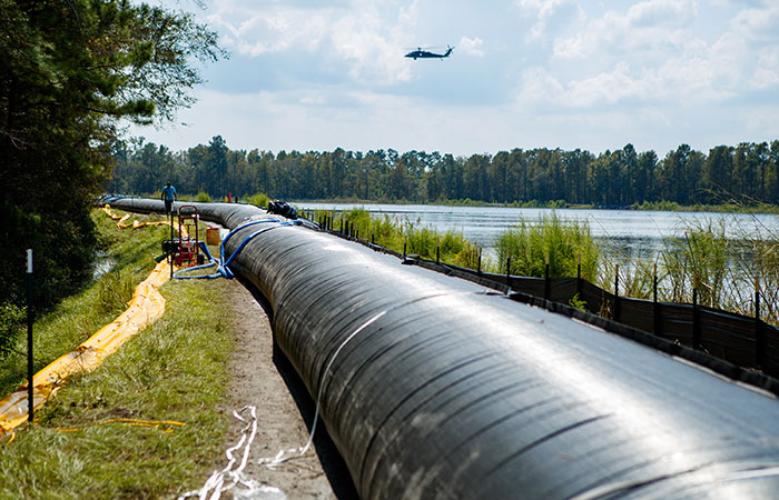 6,000 feet of AquaDam has been deployed and sits on the dike of Ash Pond 2, adding 30 inches of height to the dike.