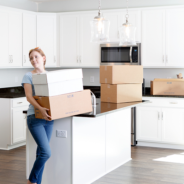 Woman moving boxes